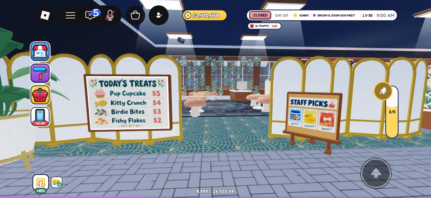 Animal-area entrance with gold-trimmed white dividers and Today’s Treats and Staff Picks signs.