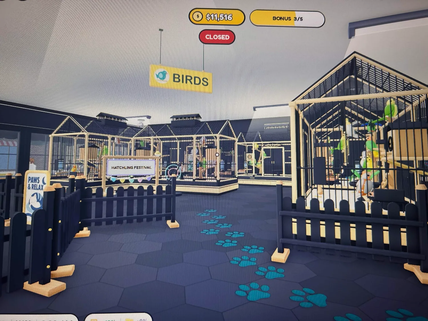 Gold-trimmed bird enclosures behind dark fences, with a Birds sign and teal paw-print aisle.