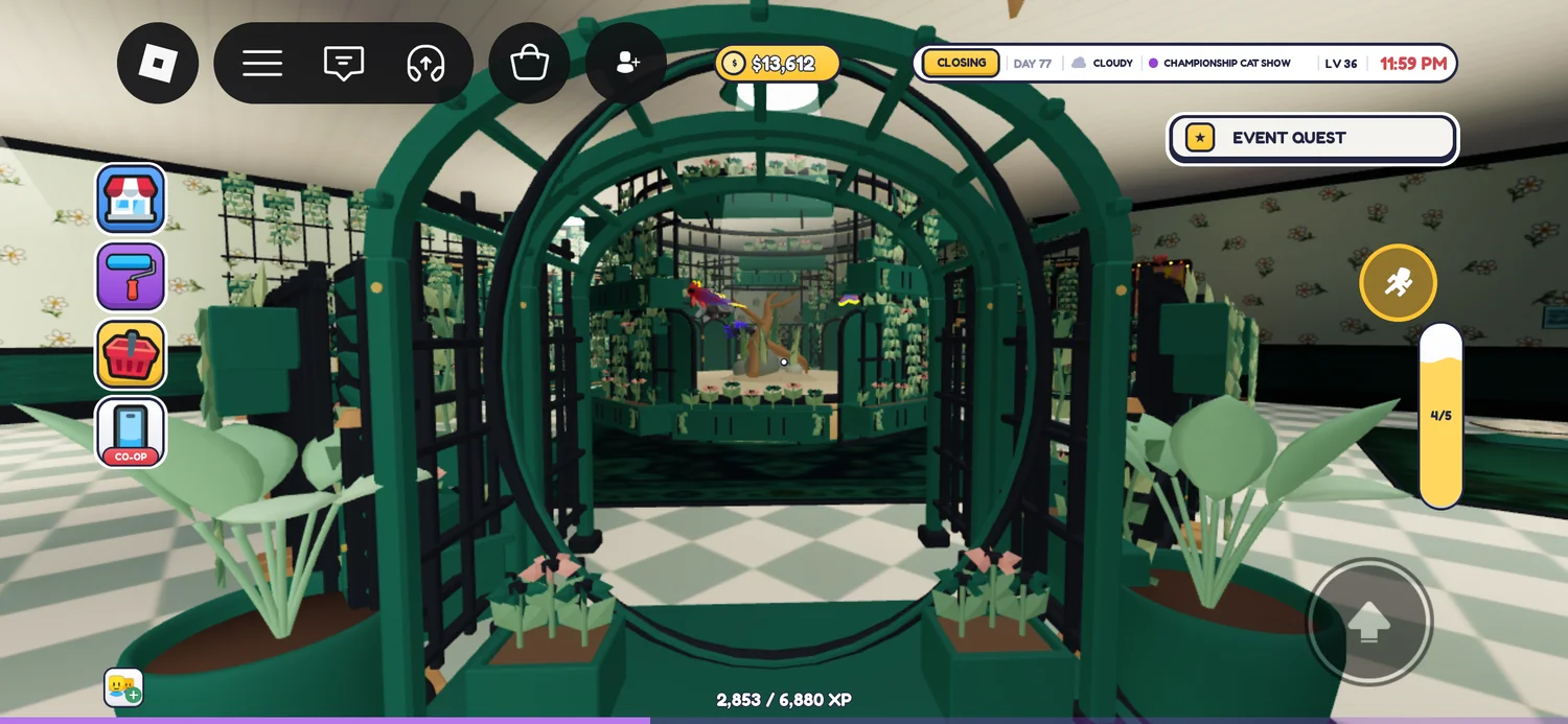 Green arched passage framing the aquarium with plants on either side.
